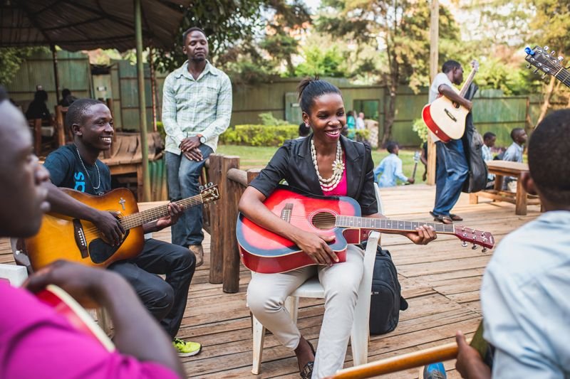 Students in a guitar circle
